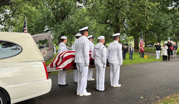Sailors from the Navy Reserve Center Indianapolis and Naval Station Great Lakes carry the casket of Seaman 1st Class Wayne Edward Newton at Grandview Cemetery in Terre Haute, Ind., on May 16, 2026. 

Newton was killed in action on Dec. 7, 1941, during the attack on Pearl Harbor, while serving on USS California (BB-44), a Tennessee-class battleship. Newton’s remains were recently identified by the Defense POW/MIA Accounting Agency as part of the USS California Project, a forensic research and recovery initiative aiming to identify 25 previously unidentified Sailors and Marines killed in the attack. In the time-honored tradition of military funerals, Rear Adm. Michael Richman, the deputy Portfolio Acquisition Executive Strategic Systems Programs for regional deterrence, presented the folded American flag to Newton’s next of kin, his nephew Mr. Stephen Newton.
