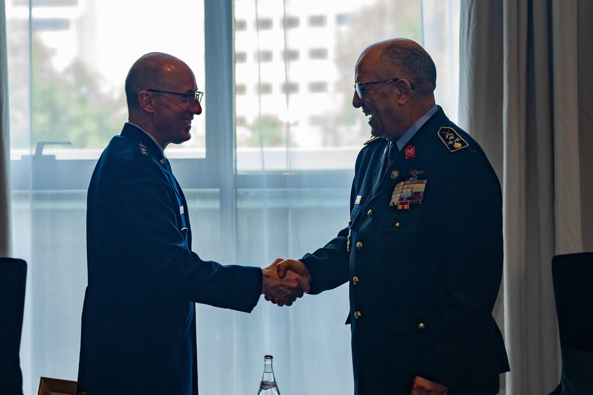leaders shake hands