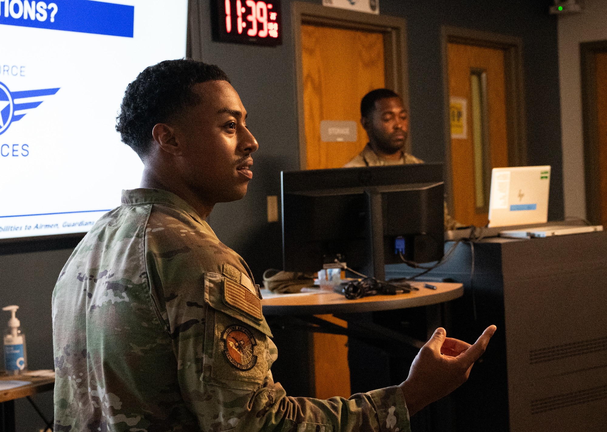 Two U.S. Airmen teach the Peer Fitness Leader course at Joint Base Charleston.