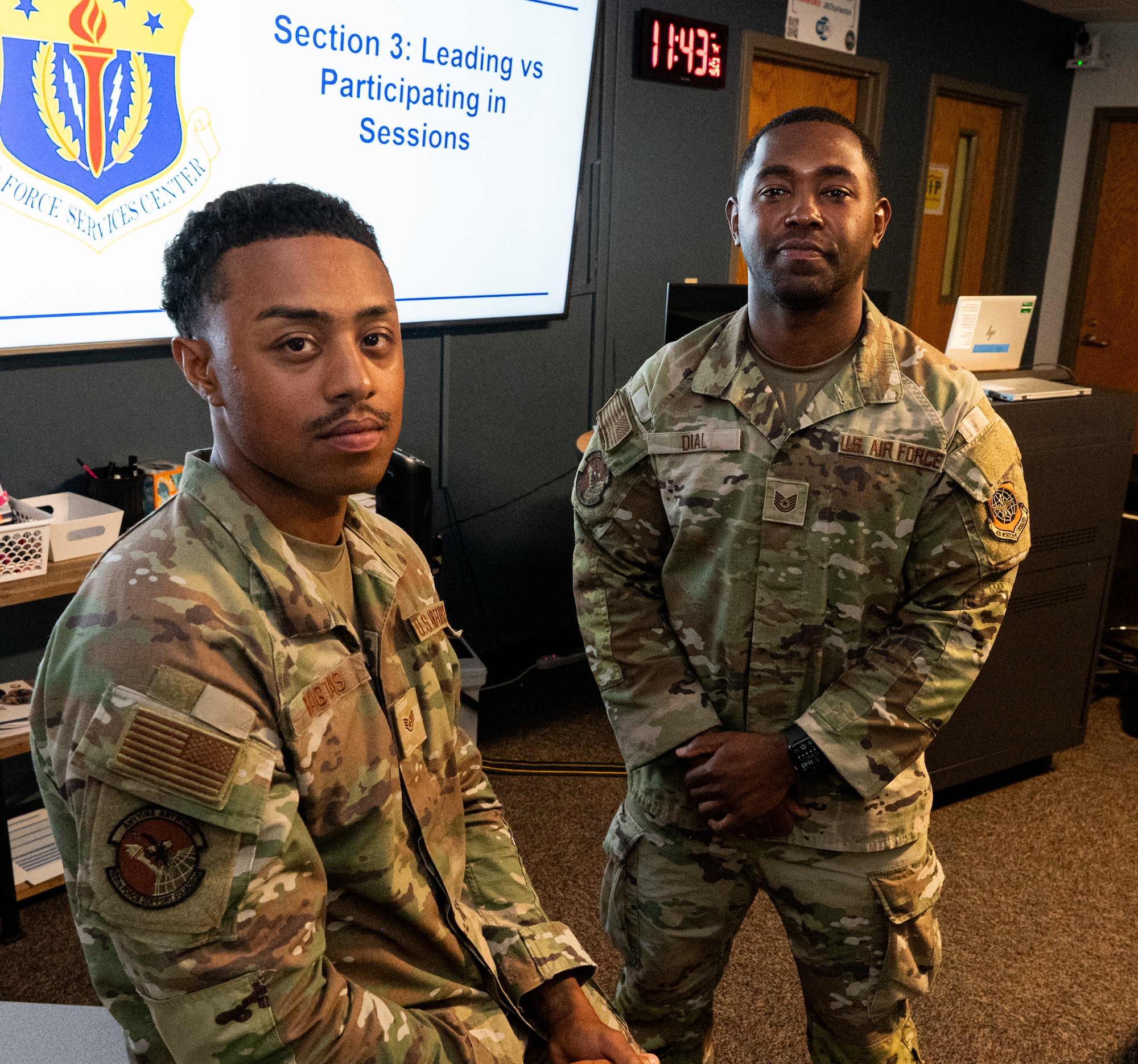 Two U.S. Airmen pose for a photo