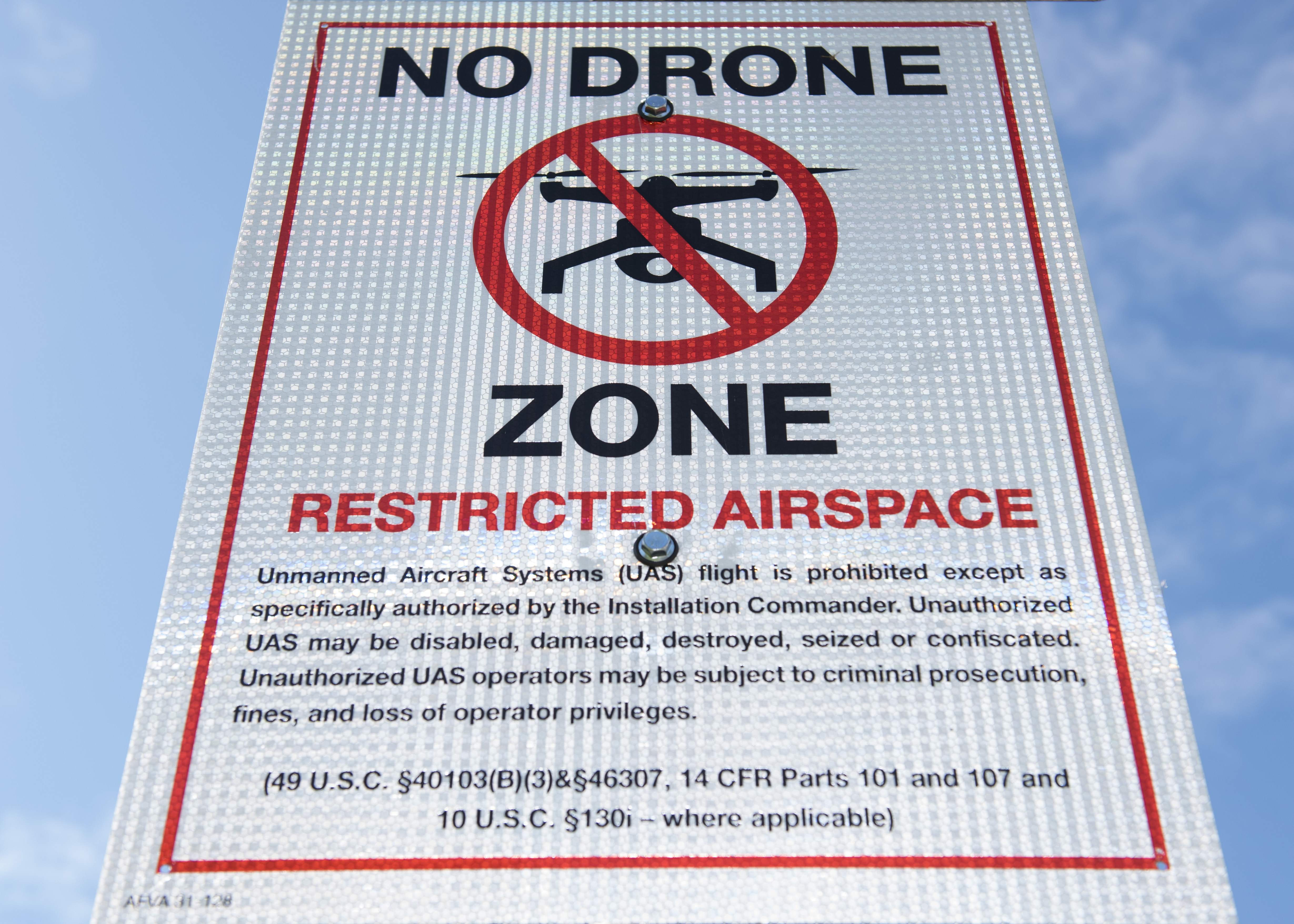 Metallic sign with "No Drone Zone" printed on it