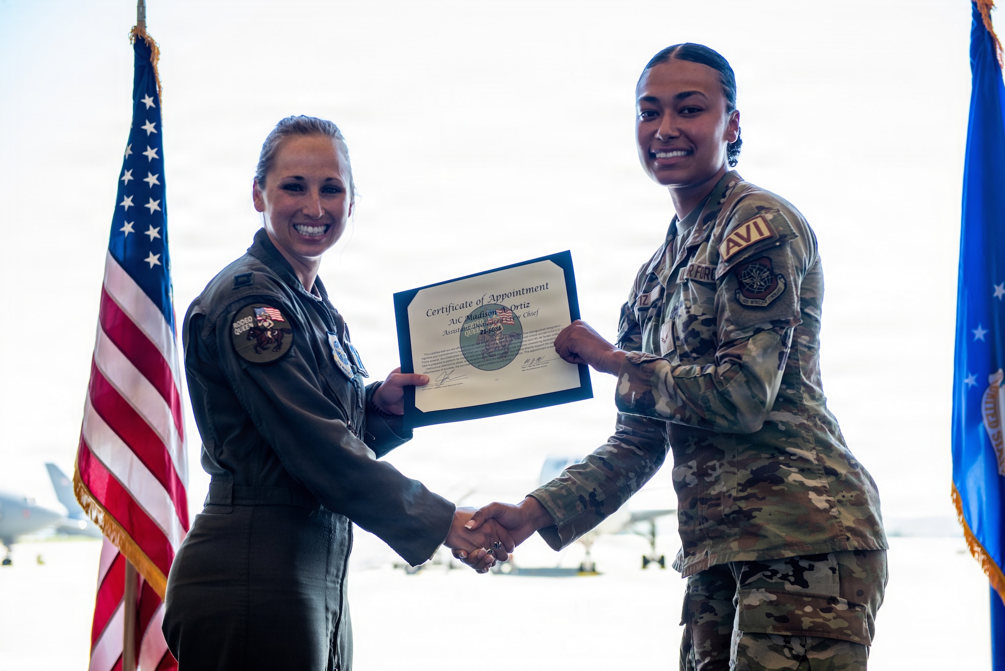 Aircraft pilot presents certificate to dedicated crew chief