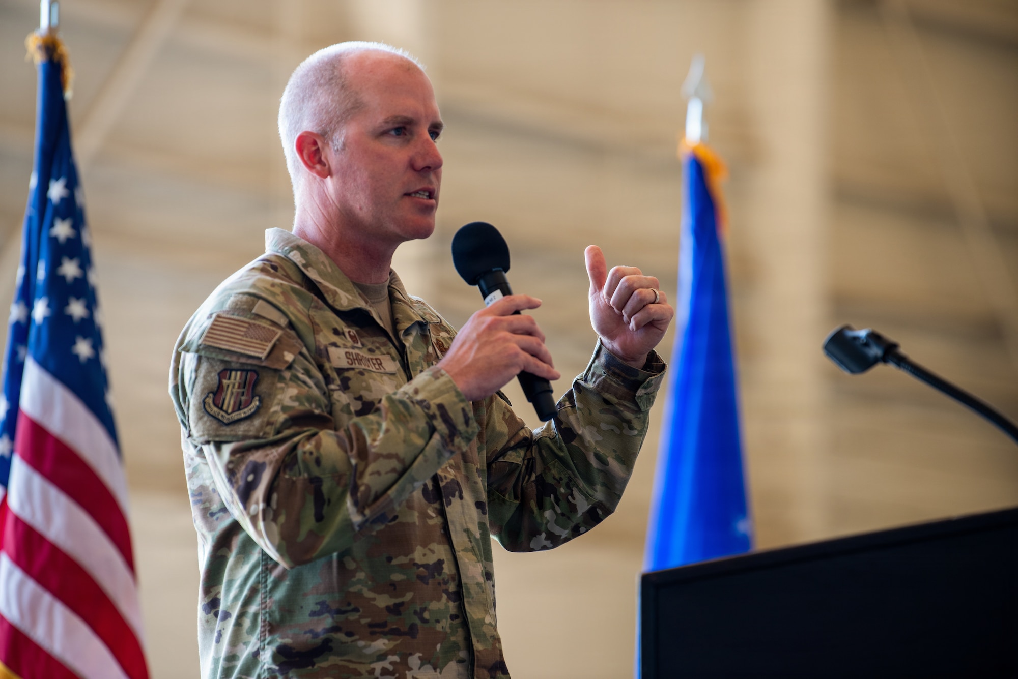 Wing commander delivers remarks during ceremony