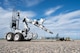 An explosive ordnance disposal robot examines a downed small unmanned aircraft system (sUAS) during Warbird Week at Minot Air Force Base, North Dakota, May 14, 2026. Warbird Week validated Team Minot’s ability to detect, defend against, and defeat sUAS threats. (U.S. Air Force photo by Senior Airman Kyle Wilson)