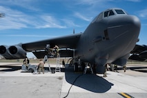 U.S. Airmen assigned to the 5th Maintenance Group load munitions onto a B-52H Stratofortress during Warbird Week at Minot Air Force Base, North Dakota, May 13, 2026. The B-52 is capable of dropping or launching the widest array of weapons in the U.S. inventory. (U.S. Air Force photo by Senior Airman Kyle Wilson)