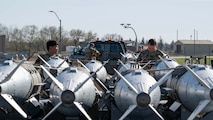 U.S. Airmen assigned to the 5th Munitions Squadron inspect munitions during Warbird Week at Minot Air Force Base, North Dakota, May 13, 2026. Warbird Week consisted of various scenarios designed to test Airmen’s ability to operate in challenging conditions. (U.S. Air Force photo by Senior Airman Kyle Wilson)