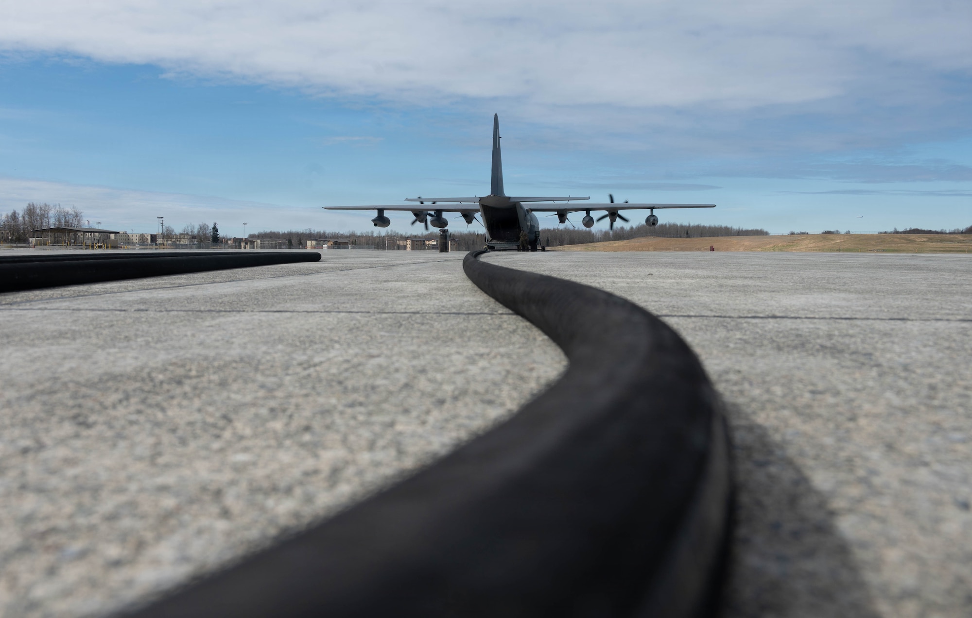 A U.S. Air Force HC-130J Combat King II assigned to the 211th Rescue Squadron is connected to refuel during a forward arming and refueling point operation on Joint Base Elmendorf-Richardson, Alaska, May 15, 2026.