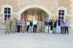 U.S. Army Mission and Installation Contracting Command Command Team Brig. Gen. Freddy Adams, Command Sgt. Maj. Jenny Bright, and Clay Cole, SES, pose for a group photo with students and instructors during the recent MICC Contracting Leader Course held at Joint Base San Antonio-Fort Sam Houston, Texas. Principals from throughout the MICC attended a three-day course designed to prepare new and incoming commanders, sergeant majors, office directors, and division chiefs to effectively run a MICC contracting office and battalion.