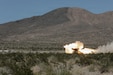 U.S. Army National Guard Soldiers with Kentucky's Bravo Battery, 1st Battalion, 623rd Field Artillery Regiment fire a rocket from a High-Mobility Artillery Tocket System (HIMARS) at Fort Irwin, California, April 24, 2026. During the rotation, Soldiers train to operate with greater speed, precision, and coordination under realistic battlefield conditions to sharpen overall combat readiness. (U.S. Army National Guard photo by Spc. Marissa Keith)