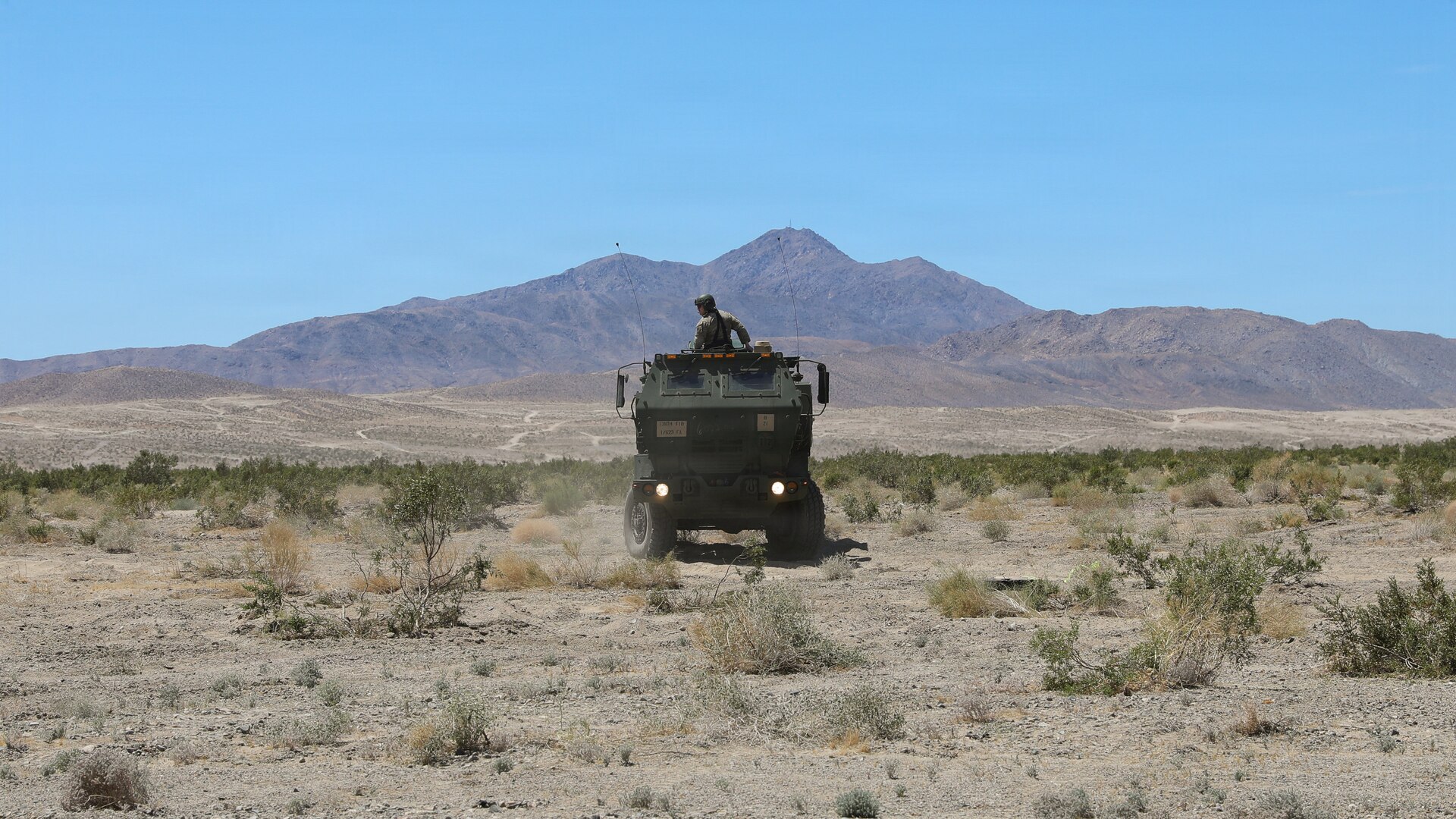 U.S. Army Sgt. Clayton Miracle confirms suitable firing location for the M142 HIMARS during a dry-fire event for Kentucky's Bravo Battery, 1st Battalion, 623rd Field Artillery at Fort Irwin, California, April 22, 2026.