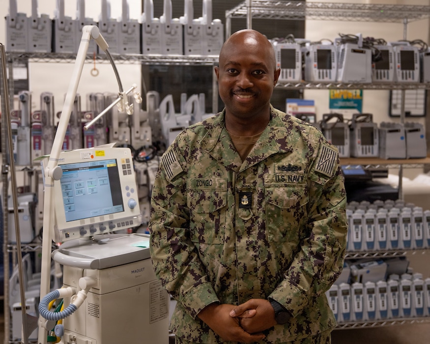 U.S. Navy Hospital Corpsman Chief Petty Officer Antares Zongo, material management equipment division leading chief petty officer at Naval Medical Center San Diego, poses amidst medical equipment at NMCSD, May 19. NMCSD employs more than 5,500 active-duty military personnel, civilians, and contractors in Southern California to deliver exceptional care afloat and ashore. (U.S. Navy photo by Mass Communication Specialist 3rd Class Jason Afable)