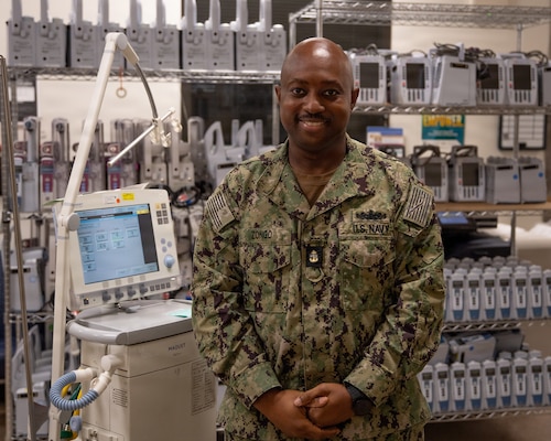 U.S. Navy Hospital Corpsman Chief Petty Officer Antares Zongo, material management equipment division leading chief petty officer at Naval Medical Center San Diego, poses amidst medical equipment at NMCSD, May 19. NMCSD employs more than 5,500 active-duty military personnel, civilians, and contractors in Southern California to deliver exceptional care afloat and ashore. (U.S. Navy photo by Mass Communication Specialist 3rd Class Jason Afable)