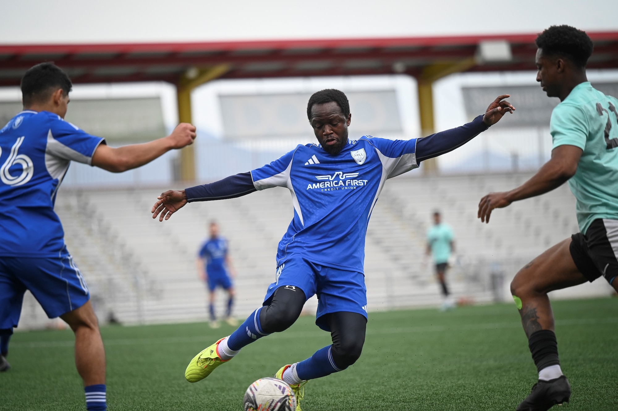 Muhammed Ceesay, a computer scientist with the Air Force Nuclear Weapons Center at Hill, kicks the ball during a Commanders Cup match.