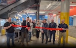 Representatives from LIFT, a DoW Manufacturing Innovation Institute, and the Manufacturing Science and Technology Program under OSD ManTech, as well as other stakeholders, celebrate the success of the fuel cell separator plate project. Image courtesy of LIFT.
