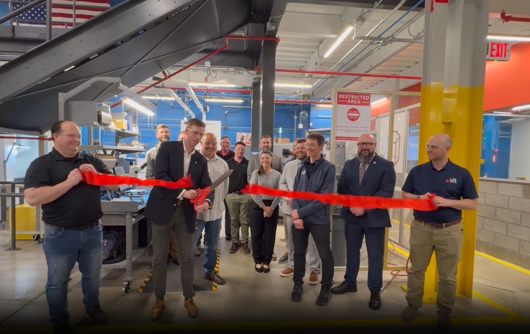 Representatives from LIFT, a DoW Manufacturing Innovation Institute, and the Manufacturing Science and Technology Program under OSD ManTech, as well as other stakeholders, celebrate the success of the fuel cell separator plate project. Image courtesy of LIFT.