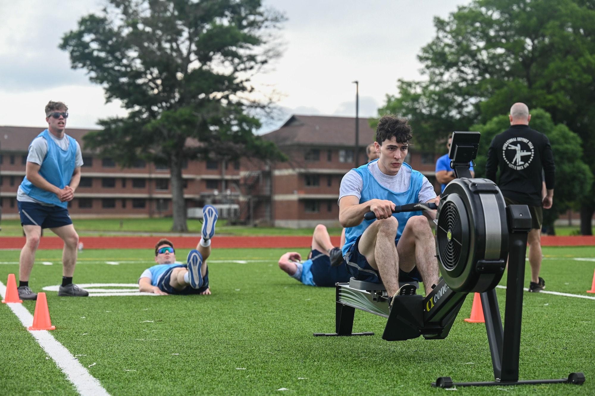 A team participates in an obstacle course.