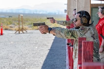 Man aiming pistol