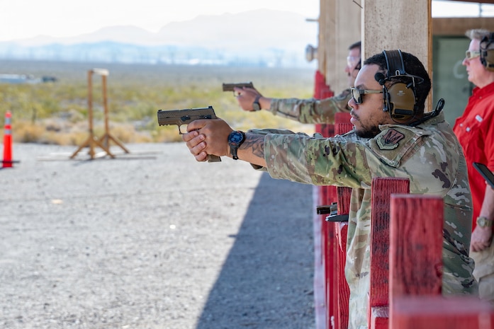 Man aiming pistol