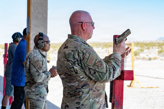 men loading their pistols