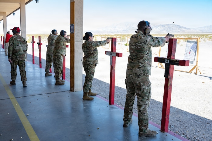 Airmen shooting their pistols