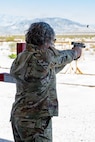 Woman shooting a pistol