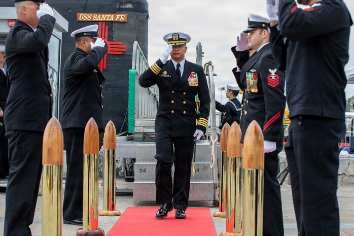 NAVAL BASE POINT LOMA, Calif. (May 15, 2026) – Capt. Phillip Sylvia Jr., commander, Submarine Squadron 11, renders a salute to side boys following the change of command ceremony for Los Angeles-class fast-attack submarine USS Santa Fe (SSN 763) onboard Naval Base Point Loma, May 15, 2026. During the ceremony, Cmdr. Eric Knepper was relieved by Cmdr. Miguel Recalde as commanding officer of Santa Fe. Santa Fe is assigned to Commander, Submarine Squadron 11, home to four Los Angeles-class fast-attack submarines which are capable of supporting various missions, including anti-submarine warfare, anti-ship warfare, strike warfare and intelligence, surveillance and reconnaissance. (U.S. Navy photo by Mass Communication Specialist 2nd Class Rashan Jefferson)