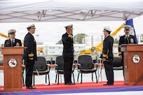 NAVAL BASE POINT LOMA, Calif. (May 15, 2026) – Cmdr. Miguel Recalde, right, renders a salute to Capt. Phillip Sylvia Jr., middle, commander, Submarine Squadron 11, during the change of command ceremony for Los Angeles-class fast-attack submarine USS Santa Fe (SSN 763) onboard Naval Base Point Loma, May 15, 2026. During the ceremony, Cmdr. Eric Knepper was relieved by Recalde as commanding officer of Santa Fe. Santa Fe is assigned to Commander, Submarine Squadron 11, home to four Los Angeles-class fast-attack submarines which are capable of supporting various missions, including anti-submarine warfare, anti-ship warfare, strike warfare and intelligence, surveillance and reconnaissance. (U.S. Navy photo by Mass Communication Specialist 2nd Class Rashan Jefferson)