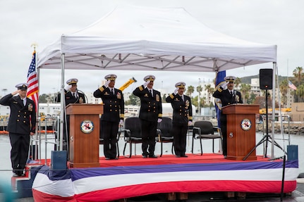 NAVAL BASE POINT LOMA, Calif. (May 15, 2026) – Official party members render salutes during the change of command ceremony for Los Angeles-class fast-attack submarine USS Santa Fe (SSN 763) onboard Naval Base Point Loma, May 15, 2026. During the ceremony, Cmdr. Eric Knepper was relieved by Cmdr. Miguel Recalde as commanding officer of Santa Fe. Santa Fe is assigned to Commander, Submarine Squadron 11, home to four Los Angeles-class fast-attack submarines which are capable of supporting various missions, including anti-submarine warfare, anti-ship warfare, strike warfare and intelligence, surveillance and reconnaissance. (U.S. Navy photo by Mass Communication Specialist 2nd Class Rashan Jefferson)