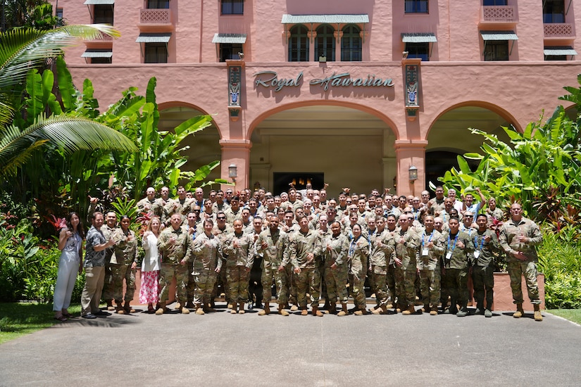 Participants of the Leadership Forum pose for a group photo outside the Royal Hawaiian Hotel during the Land Forces Pacific Symposium and Exposition in Honolulu, May 14, 2026.