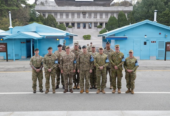 Chiefs of Army and senior enlisted leaders from Australia, Canada, New Zealand, and the United Kingdom tour the Joint Security Area’s 'Conference Row' buildings and Freedom House with LTGEN Winter. The group poses for a photo during their strategic engagement at UNC Headquarters and the JSA on April 22, 2026.