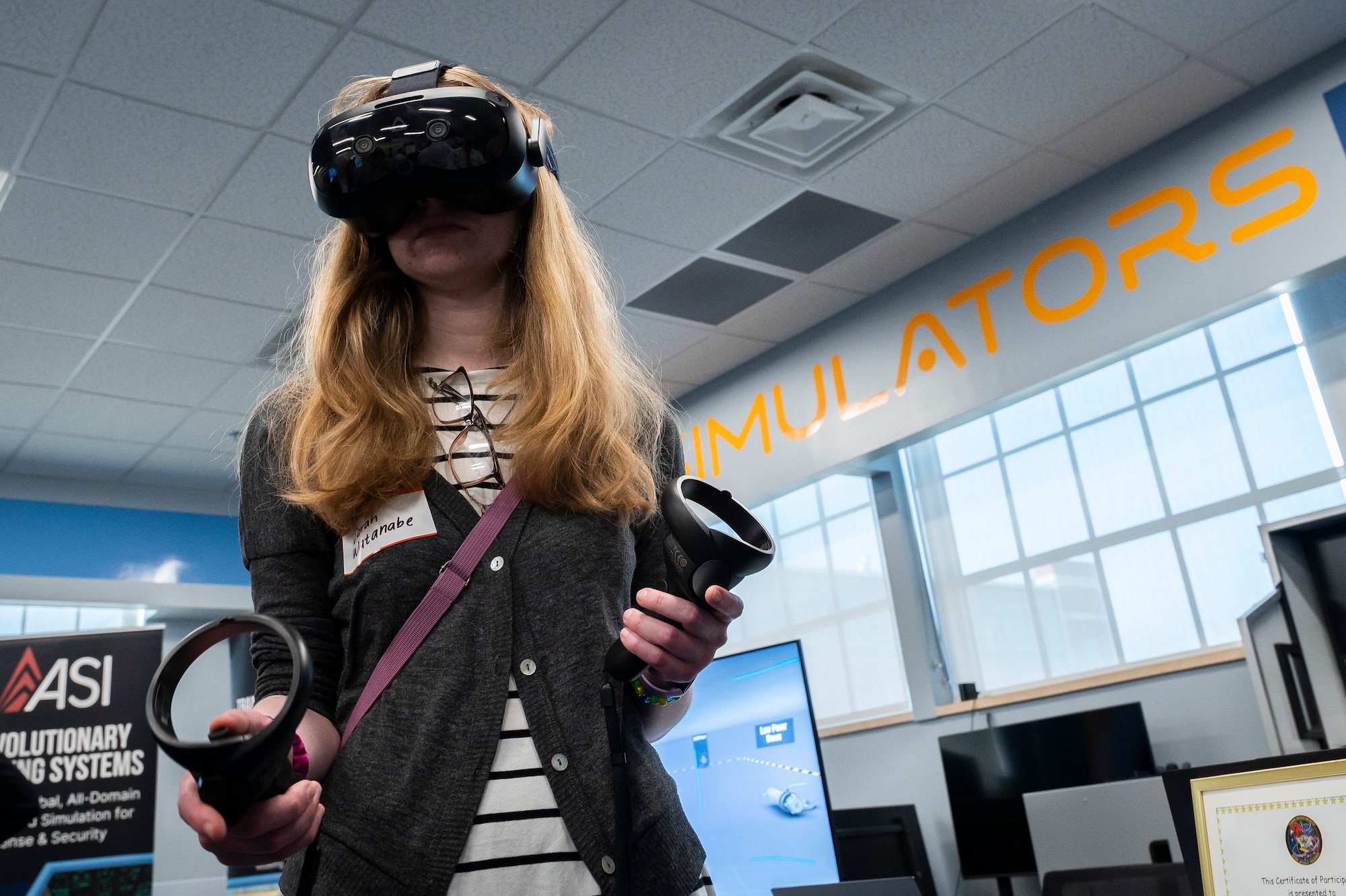 Woman wearing VR headset.