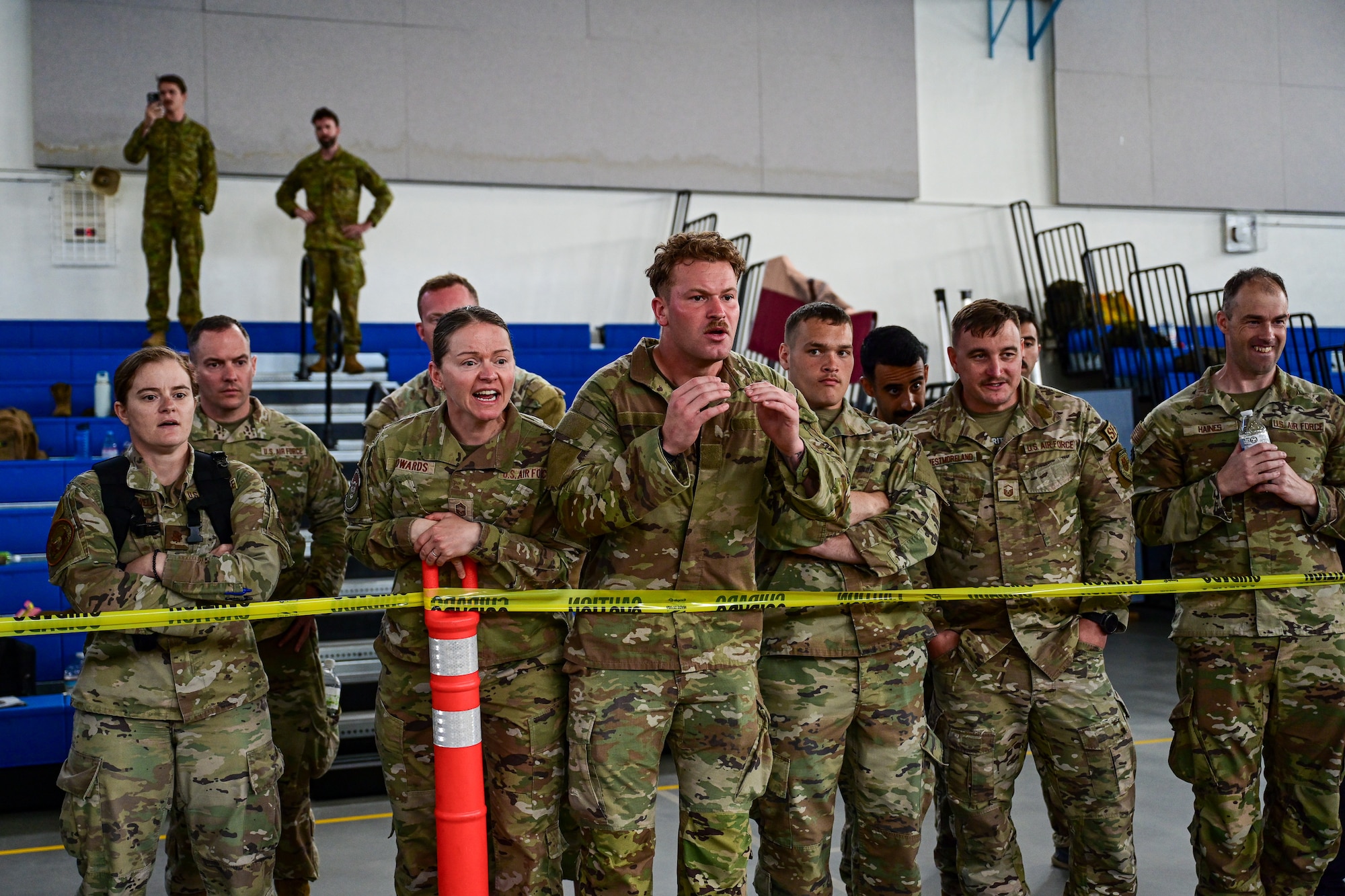 Spectators cheer for competitors during the combatives portion of Pacific Air Force’s 9th Annual Advanced Combat Skills Assessment Competition at Andersen Middle School, Andersen Air Force Base, Guam, May 22, 2026.