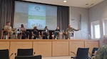 Panelists at the "Ready, Resilient, and Supported" Mental Health Awareness Month event discuss the importance of mental well-being May 14, 2026, at the Heaton auditorium in Landstuhl, Germany. The discussion focused on stress management, resilience and practical coping strategies to strengthen personal readiness.