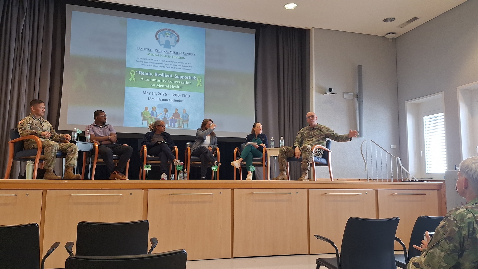 Panelists at the "Ready, Resilient, and Supported" Mental Health Awareness Month event discuss the importance of mental well-being May 14, 2026, at the Heaton auditorium in Landstuhl, Germany. The discussion focused on stress management, resilience and practical coping strategies to strengthen personal readiness.