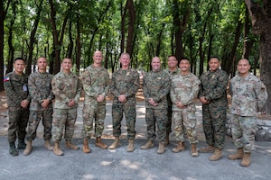 Members of the U.S. Air Force, Navy, and Philippine Air Force chapel team pose for a photo during Exercise Balikatan 2026 at Basa Air Base, April 24, 2026. Balikatan is a longstanding annual exercise between the Armed Forces of the Philippines and U.S. military that represents the strength of our alliance, improves our capable combined force, and demonstrates our commitment to regional peace and prosperity. (U.S. Air Force photo by Senior Airman Alondra Cristobal Hernandez)