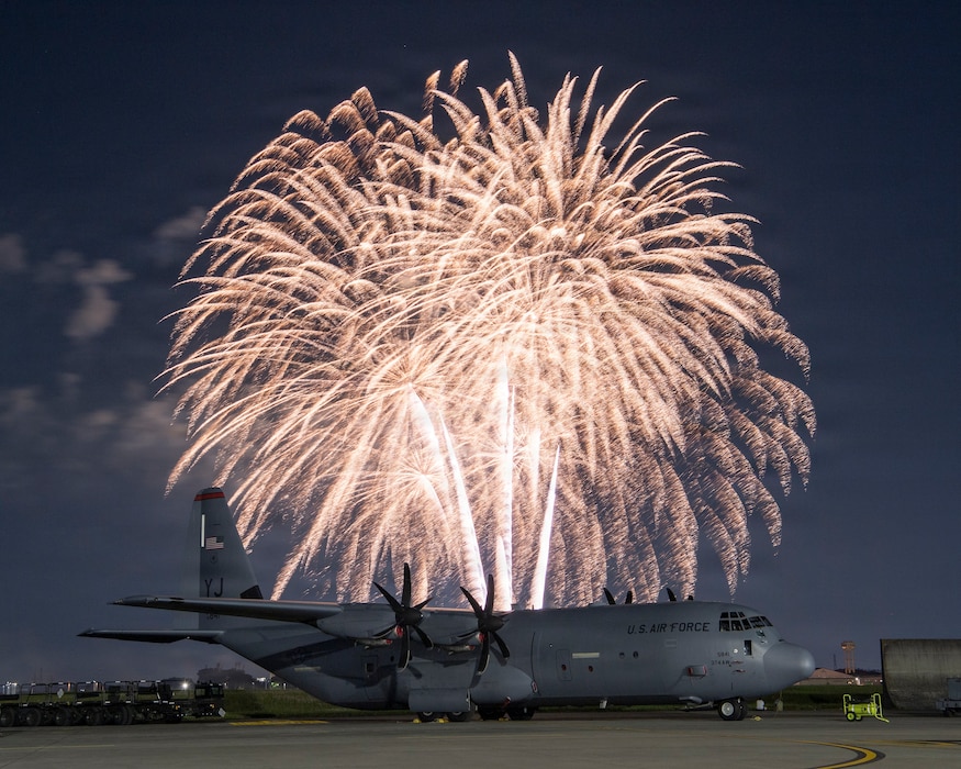 Fireworks illuminate the sky behind a U.S. Air Force C-130J Super Hercules assigned to the 36th Airlift Squadron during the Japanese-American Friendship Festival 2026 at Yokota Air Base, Japan, May 17, 2026. The two-day event celebrated the enduring U.S.-Japan alliance through aircraft displays, cultural exchanges and live entertainment. (U.S. Air Force photo by Yasuo Osakabe)