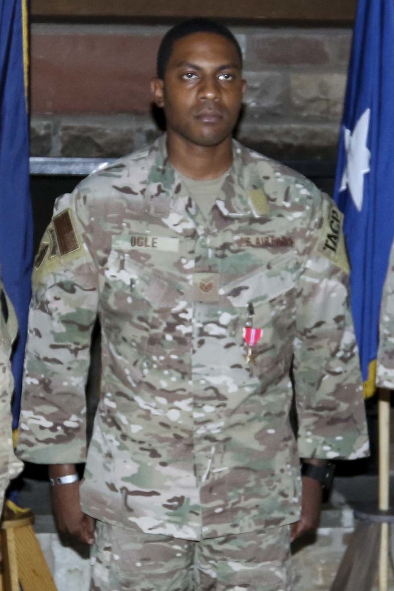 Then-Staff Sgt. Equeno Ogle of the 148th Air Support Operations Squadron (ASOS), 193rd Special Operations Wing, receives a Bronze Star medal on Sept. 24, 2019, at Fort Indiantown Gap, Pennsylvania, for service in combat while assigned as Joint Terminal Attack Controllers in Syria earlier in 2019. (U.S. Army National Guard photo by Staff Sgt. Zane Craig)