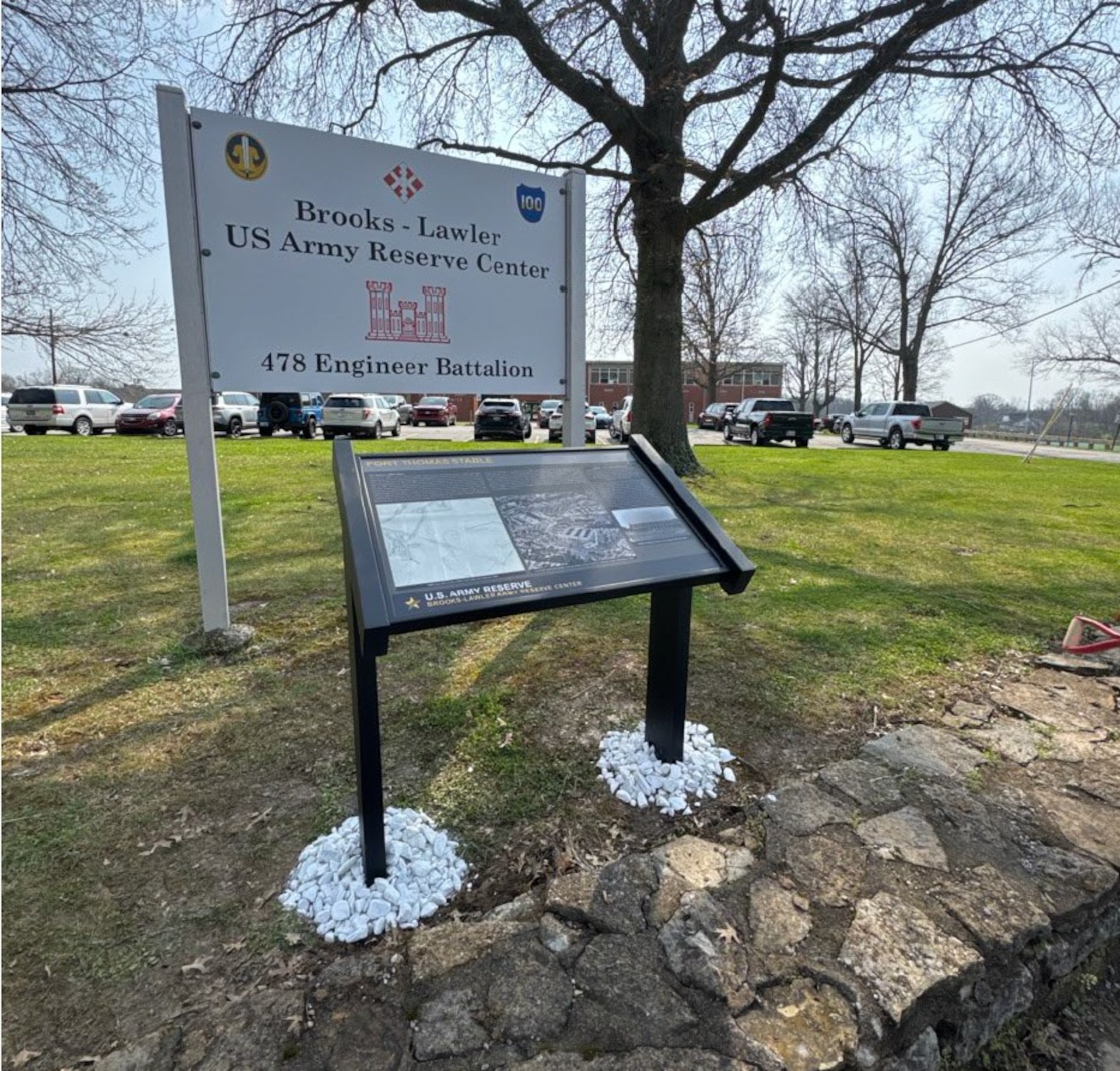 A newly installed interpretive panel at the 81st Readiness Division’s Brooks-Lawler Army Reserve Center, Fort Thomas, KY commemorates the installation’s historic horse stable which now serves as a storage facility. Stables were integral to the mission and operation of Army posts prior to World War II.