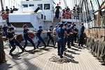 Coast Guard Academy cadets practice line-handling aboard USCGC Eagle (WIX 327) while moored in Savannah, Georgia, May 11, 2026. The cadets participated in "School of the Ship" training to learn how to safely, accurately and competently manipulate lines as well as become familiarized with seamanship.