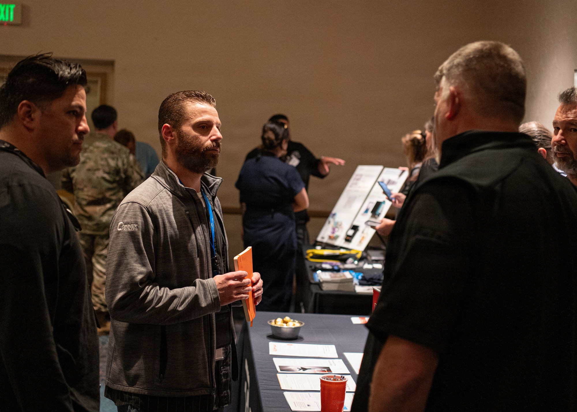Team Vandenberg Guardians, Airmen, and government civilians and contractors attend the Space Systems Command Cyber Expo 2026 hosted at the Pacific Coast Center at Vandenberg Space Force Base, Calif., May 14, 2026. Guardians, Airmen, and government civilians had the opportunity to visit with commercial industry leaders in areas such as cybersecurity, network operations, acquisitions and technical evaluation, strategic planning methodologies, and more. (U.S. Space Force photo by Tech. Sgt. Draeke Layman)