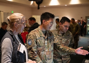 Team Vandenberg Guardians, Airmen, and government civilians and contractors attend the Space Systems Command Cyber Expo 2026 hosted at the Pacific Coast Center at Vandenberg Space Force Base, Calif., May 14, 2026. Guardians, Airmen, and government civilians had the opportunity to visit with commercial industry leaders in areas such as cybersecurity, network operations, acquisitions and technical evaluation, strategic planning methodologies, and more. (U.S. Space Force photo by Tech. Sgt. Draeke Layman)