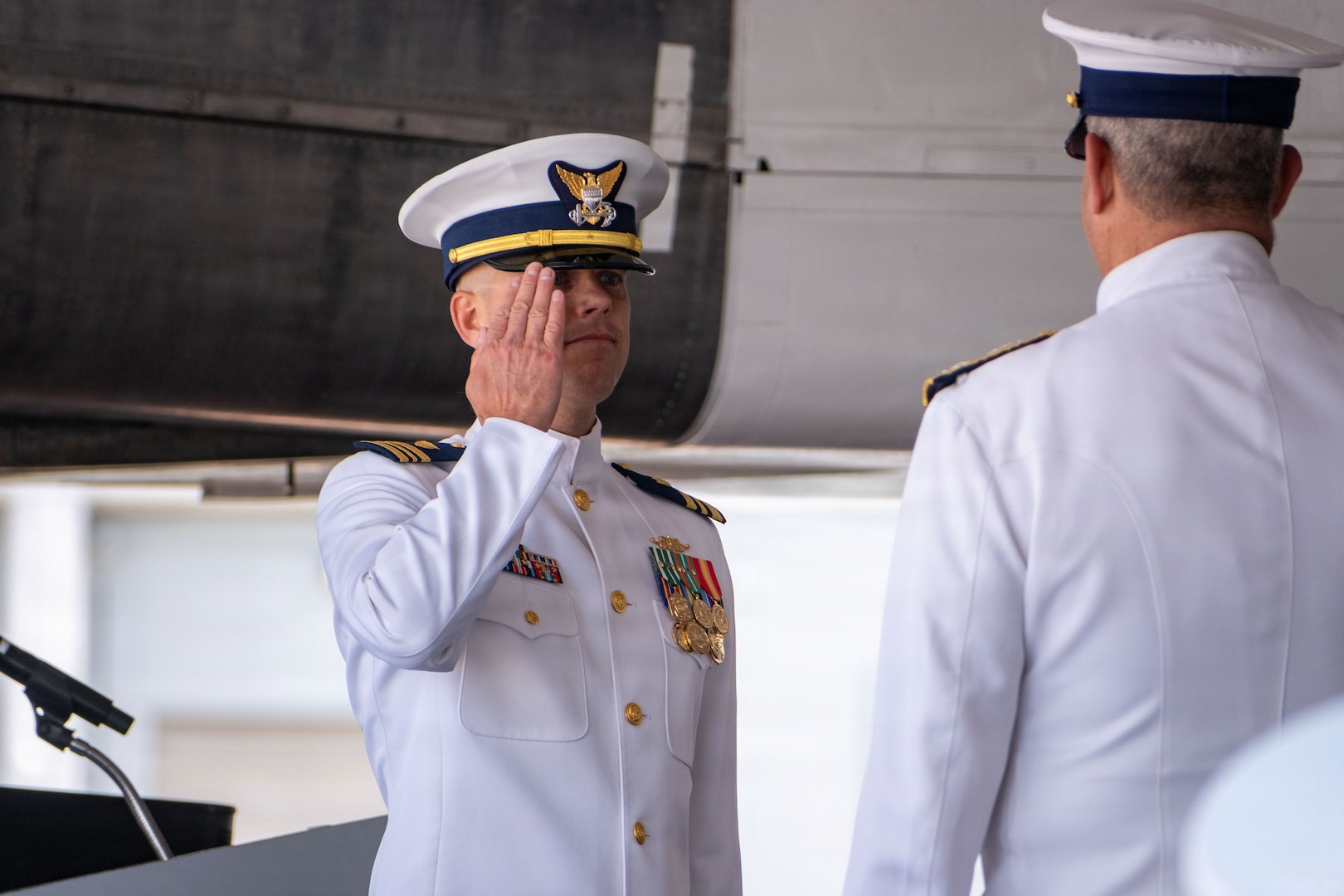 U.S. Coast Guard Lt. Cmdr. Brenden Kelley, commanding officer of USCGC Vincent Danz (WPC 1162), salutes Vice Adm. Thomas G. Allan Jr., vice commandant of the Coast Guard, during the cutter’s commissioning ceremony at Pier 86 near the Intrepid Museum in New York, May 22, 2026. Allan served as the ceremony’s presiding officer as the cutter formally entered active Coast Guard service. (U.S. Coast Guard photo by Petty Officer 2nd Class Sydney Phoenix)