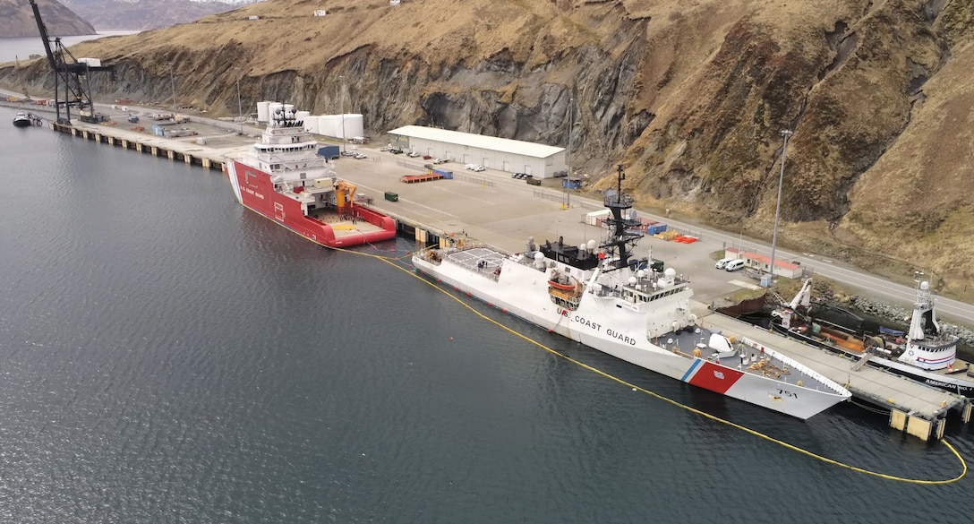 USCGC Storis (WAGB 21) and USCGC Waesche (WMSL 751) conduct a proof‑of‑concept fueling‑at‑sea evolution while moored in Dutch Harbor, Alaska, May 1, 2026. The evolution marked a successful operation as first of its kind with a new Polar Asset. (U.S. Coast Guard photo via shipboard drone by Lt. j.g. Genzo Matua Gonzales)
