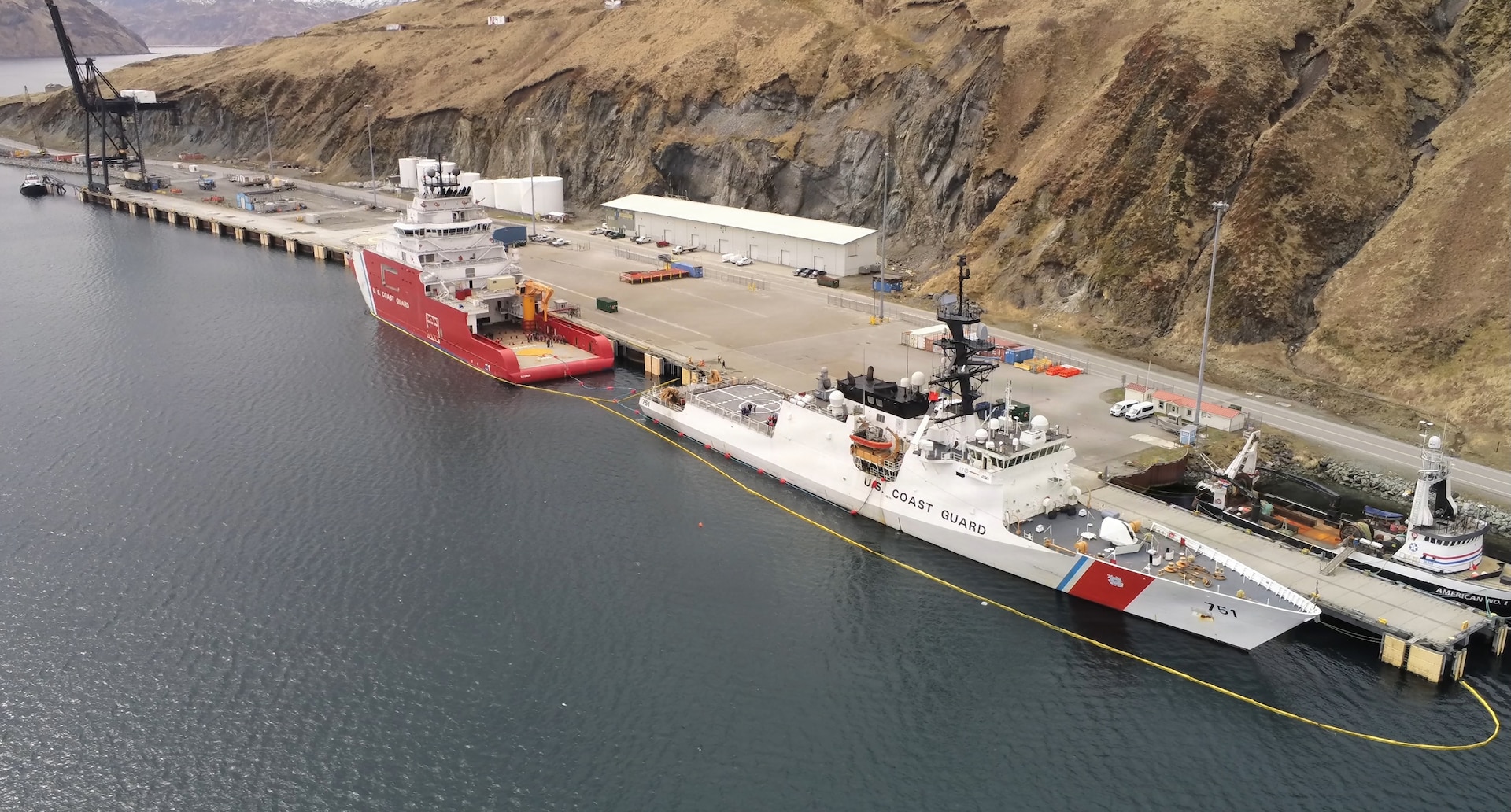 USCGC Storis (WAGB 21) and USCGC Waesche (WMSL 751) conduct a proof‑of‑concept fueling‑at‑sea evolution while moored in Dutch Harbor, Alaska, May 1, 2026. The evolution marked a successful operation as first of its kind with a new Polar Asset. (U.S. Coast Guard photo via shipboard drone by Lt. j.g. Genzo Matua Gonzales)