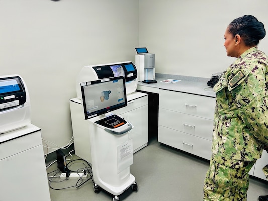 Capt. Janiese Cleckley observes an innovative 3D dental implant printing system during a tour of medical facilities at Edwards Air Force Base on May 14, 2026. Leaders from Naval Hospital Twentynine Palms visited Edwards Air Force Base to strengthen cross-service collaboration, improve interoperability, and identify new opportunities to enhance medical readiness and healthcare delivery across the Mojave Desert region. (Courtesy photo)