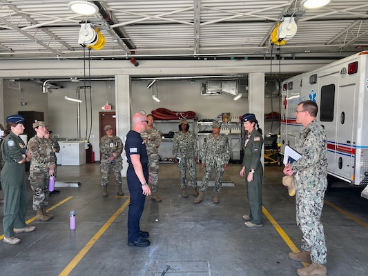 Leaders from Naval Hospital Twentynine Palms meet with staff assigned to the 412th Medical Group during a tour of medical facilities at Edwards Air Force Base on May 14, 2026. Naval Hospital Twentynine Palms leaders visited Edwards Air Force Base to strengthen cross-service collaboration, improve interoperability, and identify new opportunities to enhance medical readiness and healthcare delivery across the Mojave Desert region. (Courtesy photo)