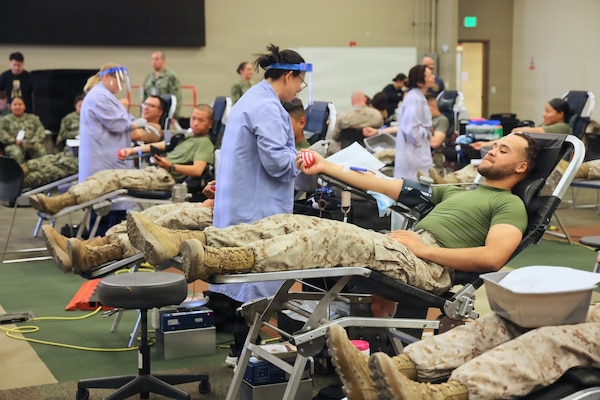 A Marine donates blood during a record-breaking Armed Services Blood Program blood drive at Marine Corps Air Ground Combat Center Twentynine Palms, May 6, 2026. The blood drive collected 117 units of blood in support of military operations overseas, setting a new installation record for collections during a single event. (U.S. Navy photo by Christopher Jones, NH/NMRTC Twentynine Palms public affairs officer)