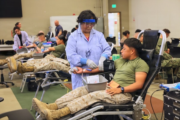 A Marine donates blood during a record-breaking Armed Services Blood Program blood drive at Marine Corps Air Ground Combat Center Twentynine Palms, May 6, 2026. The blood drive collected 117 units of blood in support of military operations overseas, setting a new installation record for collections during a single event. (U.S. Navy photo by Christopher Jones, NH/NMRTC Twentynine Palms public affairs officer)