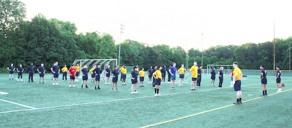 Combining physical readiness with a solemn holiday tribute, NMRTC Patuxent River brought personnel together this week at the Naval Air Station Patuxent River Drill Hall Field to take on the 'Murph' challenge in observance of Memorial Day.  

The warm-up routine was led by Assistant Command Fitness Leaders Hospital Corpsman 3rd Class Jaden Sprague, Hospital Corpsman 2nd Class Ethan Johnson, and Hospital Corpsman 3rd Class Lucas Arteaga to prepare the crew for a modified version of the grueling 'Murph' challenge.

Held ahead of the Memorial Day weekend, the workout builds unit cohesion while paying tribute to Navy SEAL Lt. Michael Murphy, who was killed in action in Afghanistan in 2005 and posthumously awarded the Medal of Honor. The traditional routine consists of a 1-mile run, 100 pull-ups, 200 push-ups, 300 squats, and a final 1-mile run.