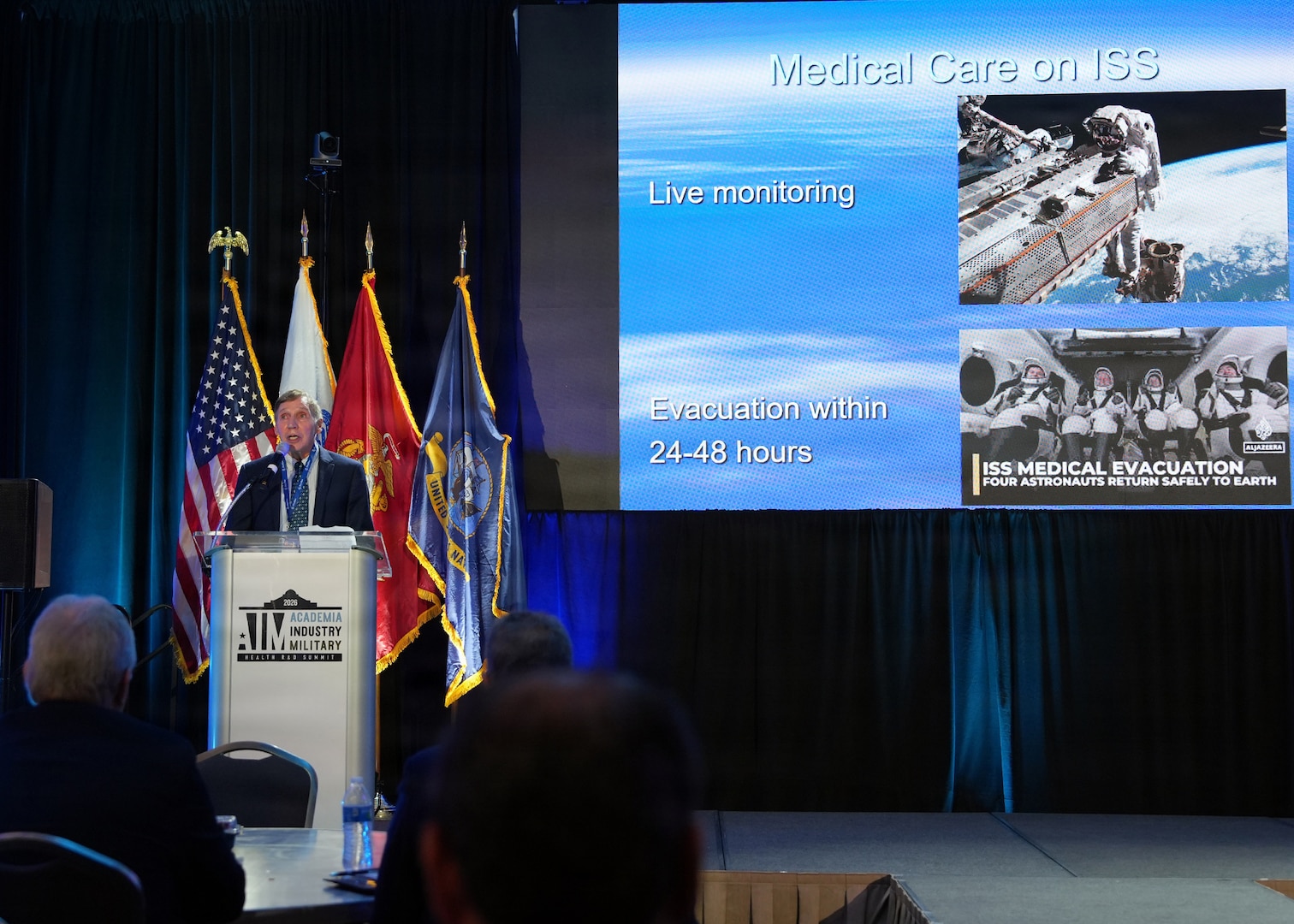 SAN ANTONIO – (May 19, 2026) – NASA Astronaut, retired Marine Corps Col. Dr. David Hilmers, a professor at Baylor College of Medicine, served as the lunch keynote speaker at the annual AIM Health R&D Summit held at the Henry B. Gonzalez Convention Center. Designed to promote cross-sector collaboration in the development of life-saving battlefield technologies, the one-day summit brings together top innovators from academia, industry, and the military to accelerate the research, development, and commercialization of transformative medical technologies. Collaborating and working alongside a wide range of research and development partners keeps Navy Medicine Research & Development (NMR&D) abreast of best practices and advances in medical knowledge. NAMRU San Antonio, part of NMR&D conducts gap-driven combat casualty care, craniofacial, and directed energy research in support of Navy, Marine Corps and joint U.S. warfighter health readiness and lethality while engaged in routine and expeditionary operations. (U.S. Navy photo by Burrell Parmer, NAMRU San Antonio Public Affairs/Released)